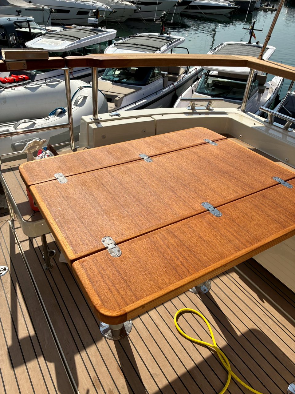 The same table, refinished and back aboard